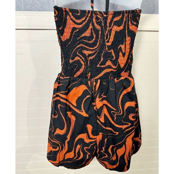 The Get Orange & Black Print Smocked Halter Romper - Picture 5 of 9